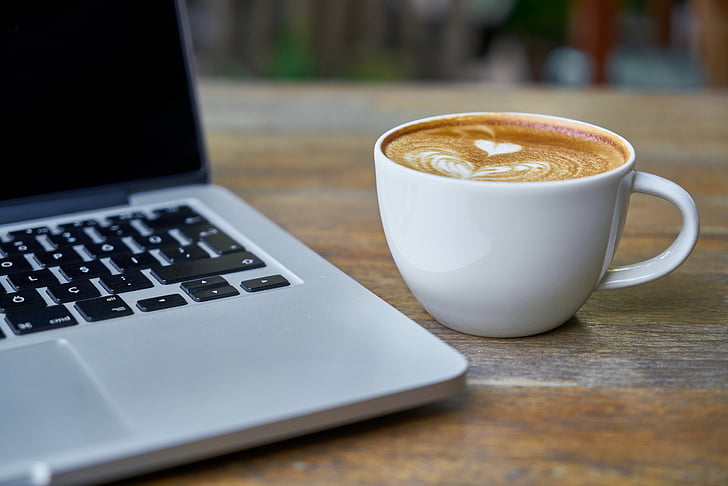 photo of coffee and laptop
